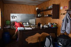03B Our Cook Cleaning Up In The Kitchen At Garabashi Camp 3730m To Climb Mount Elbrus
